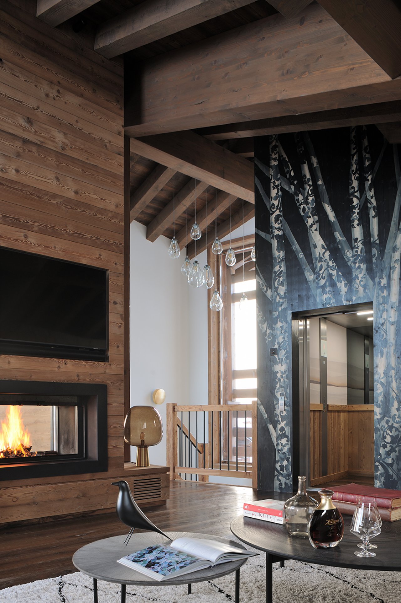 Espace jour-Ascenseur-Cheminée-chalet-courchevel